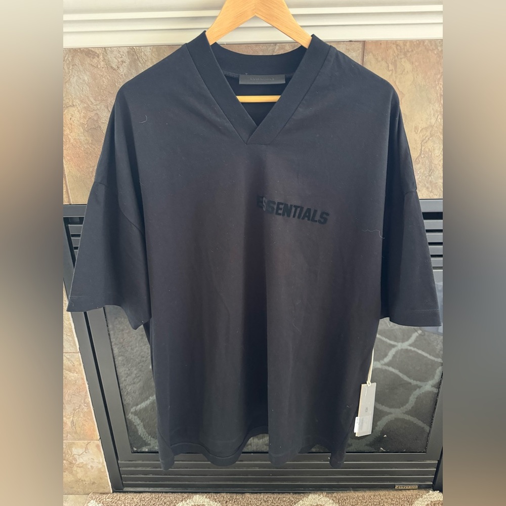 New With Tags Fear of God Essentials men’s black v-neck tee in size Medium